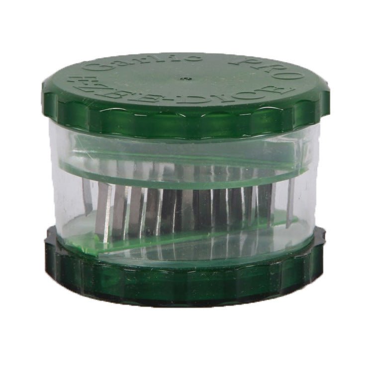 Set de deux épluche-ail en silicone vert et rose design ergonomique